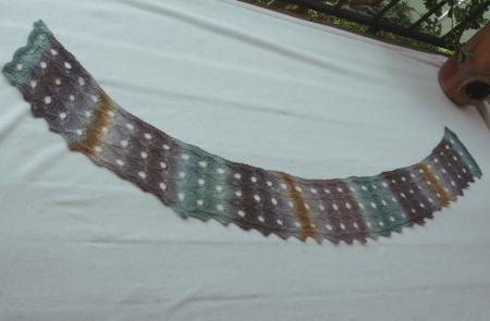 wet blocking lace - use your hands first to set the general shape