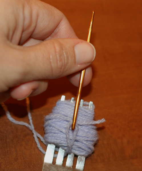 Using a fork to make a pom pom